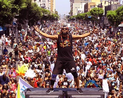 Hollywood Carnival Machel Montano on a truck with the carnival crowd behind him